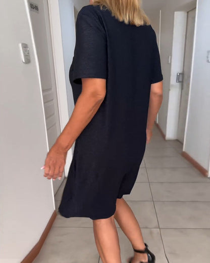 Jeanne | Robe torsadée à manches courtes et col V